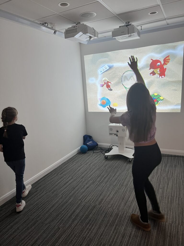 Projector-based therapeutic game equipment for the children on Kipling Ward